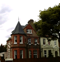 Image of corner turretted house